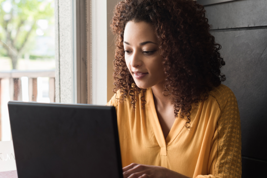 Woman using laptop.
